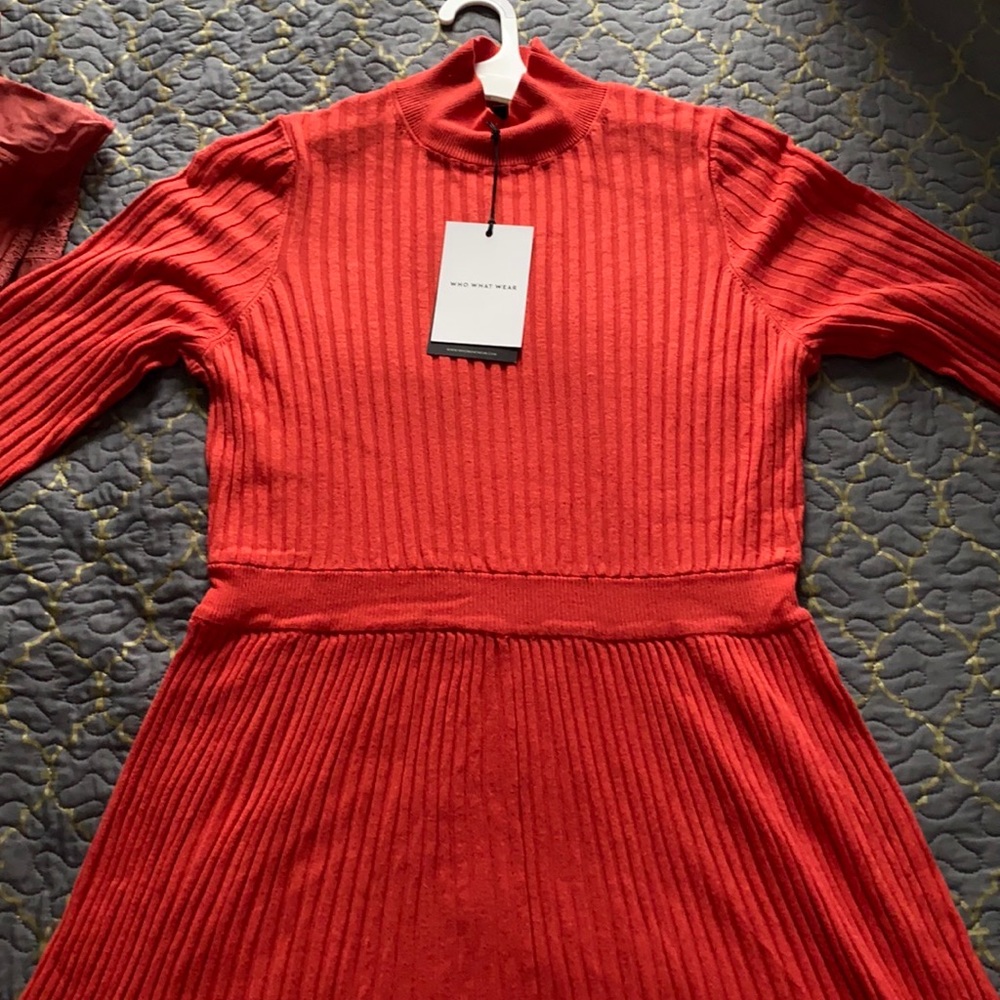 a orange fitted rib dress.